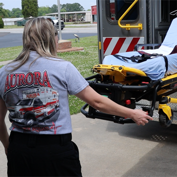 Ashley Gomez operates a stretcher